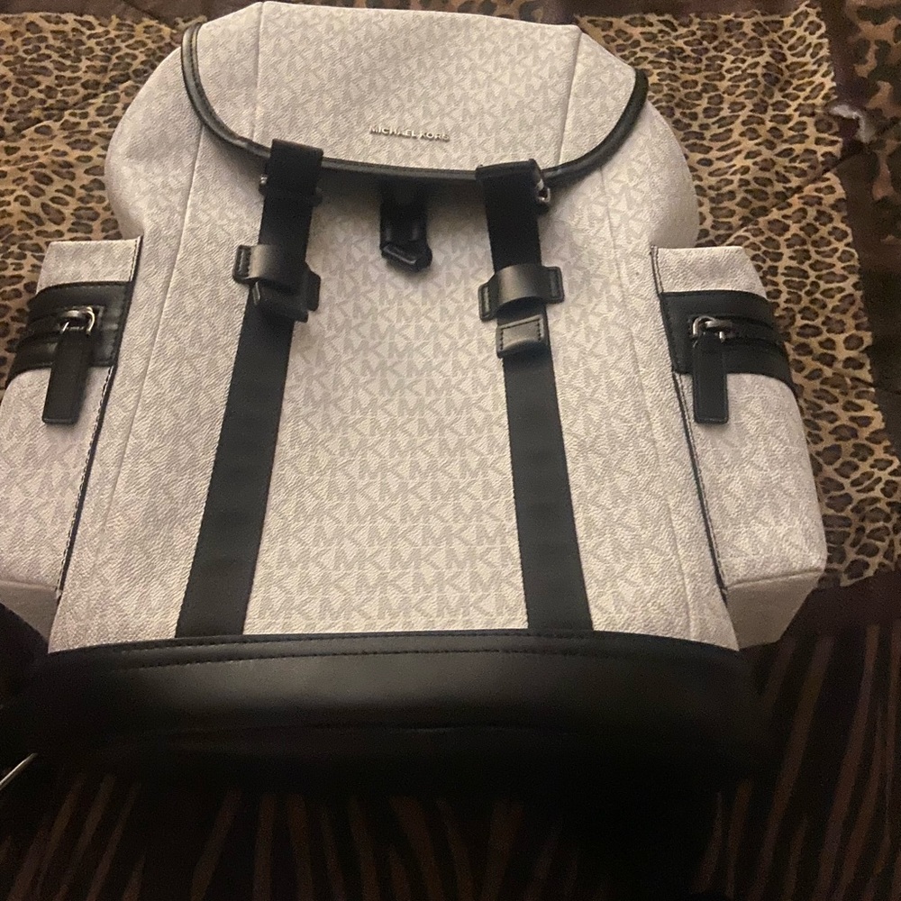 Michael Kore’s backpack.